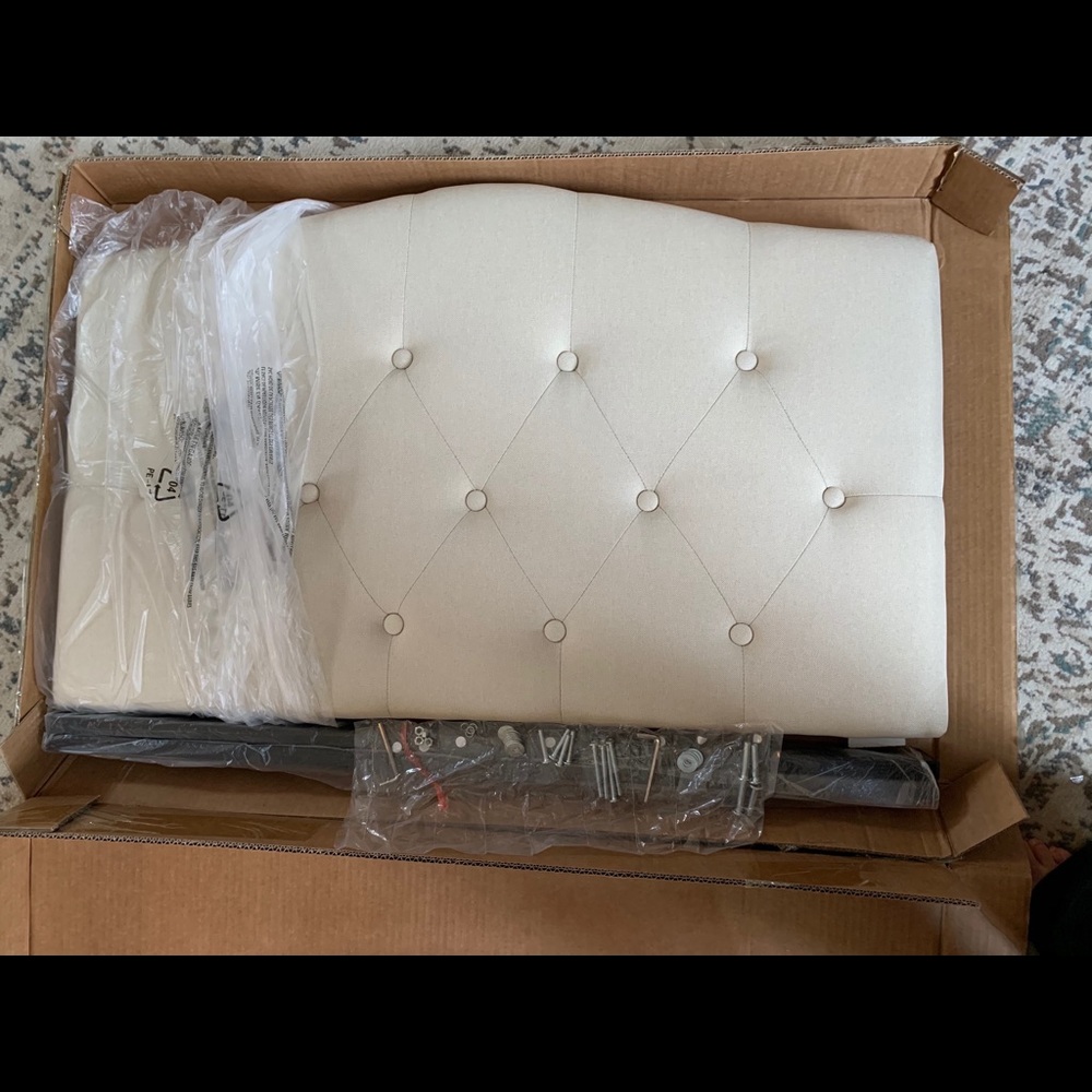 Twin size headboard- beige color, never used.